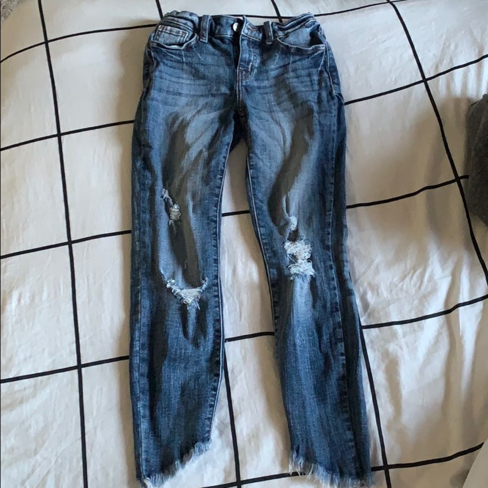 distressed denim jeans